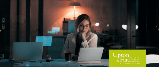 Viewing laptop - employee