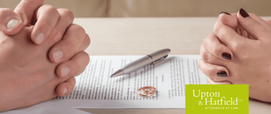 Divorcing couple with paperwork