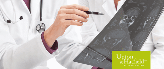 Two doctors viewing chart